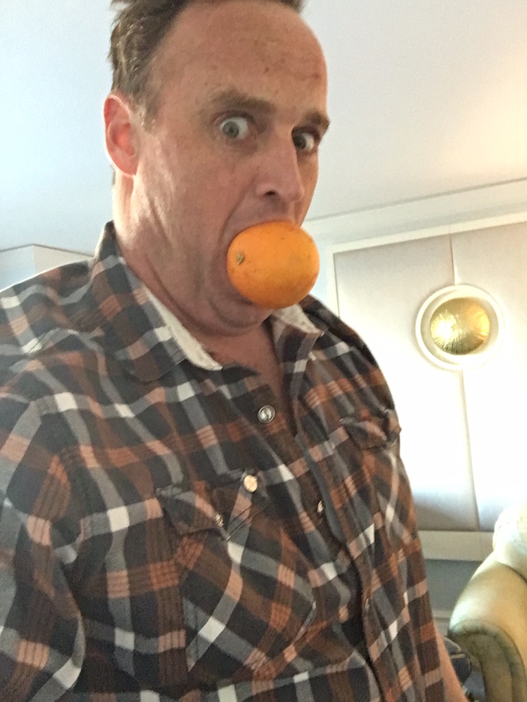 Matt Eating an Orange